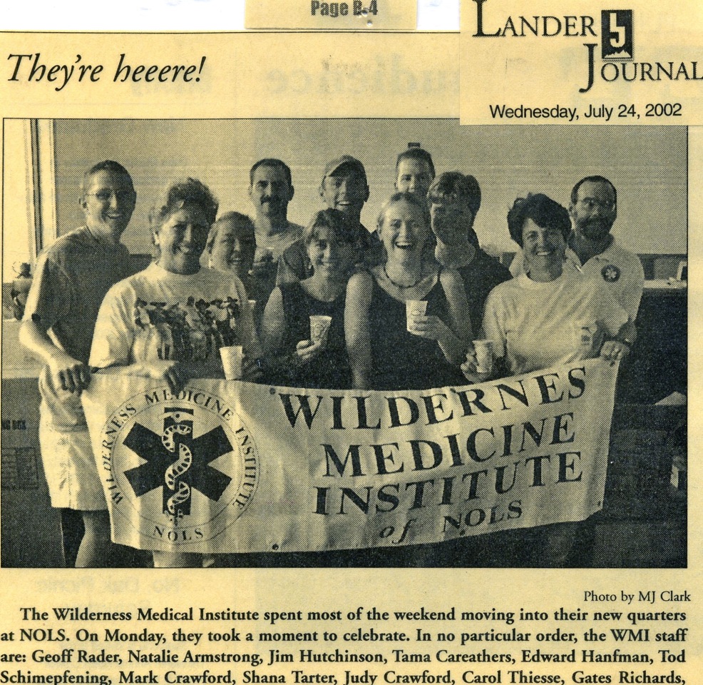 Photo of a black and white newspaper story announcing the arrival of WMI to NOLS in Lander