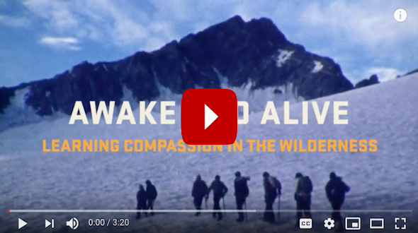NOLS "awake and alive: learning compassion in the wilderness" youtube thumbnail with students trekking across a snowfield in the mountains