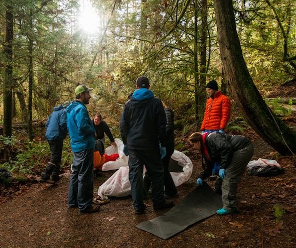 NOLS Wilderness Medicine students practice caring for patients in the woods