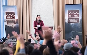 smiling speaker presents at the 2018 WRMC