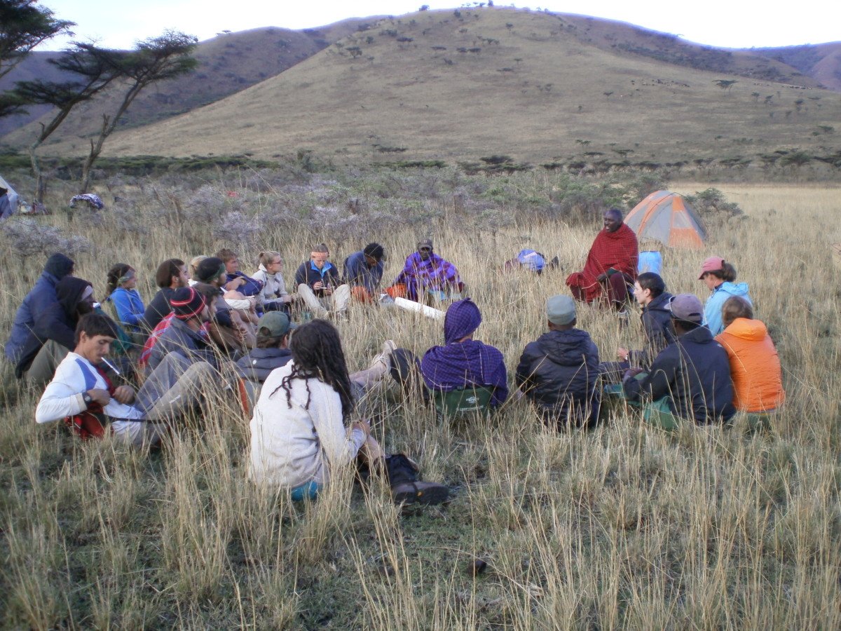 NOLS group learning from Maasai member in Tanzania
