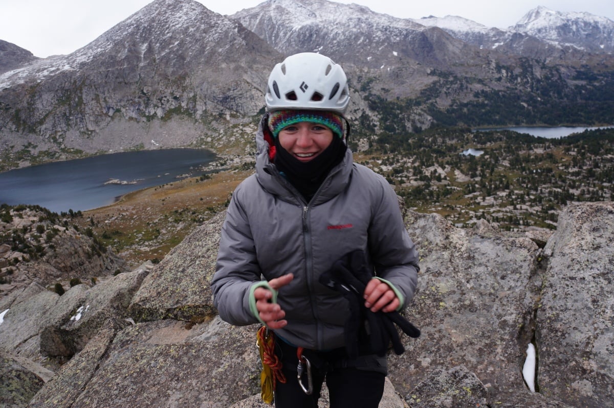 Maddy smiling and looking cold while mountaineering in Wyoming
