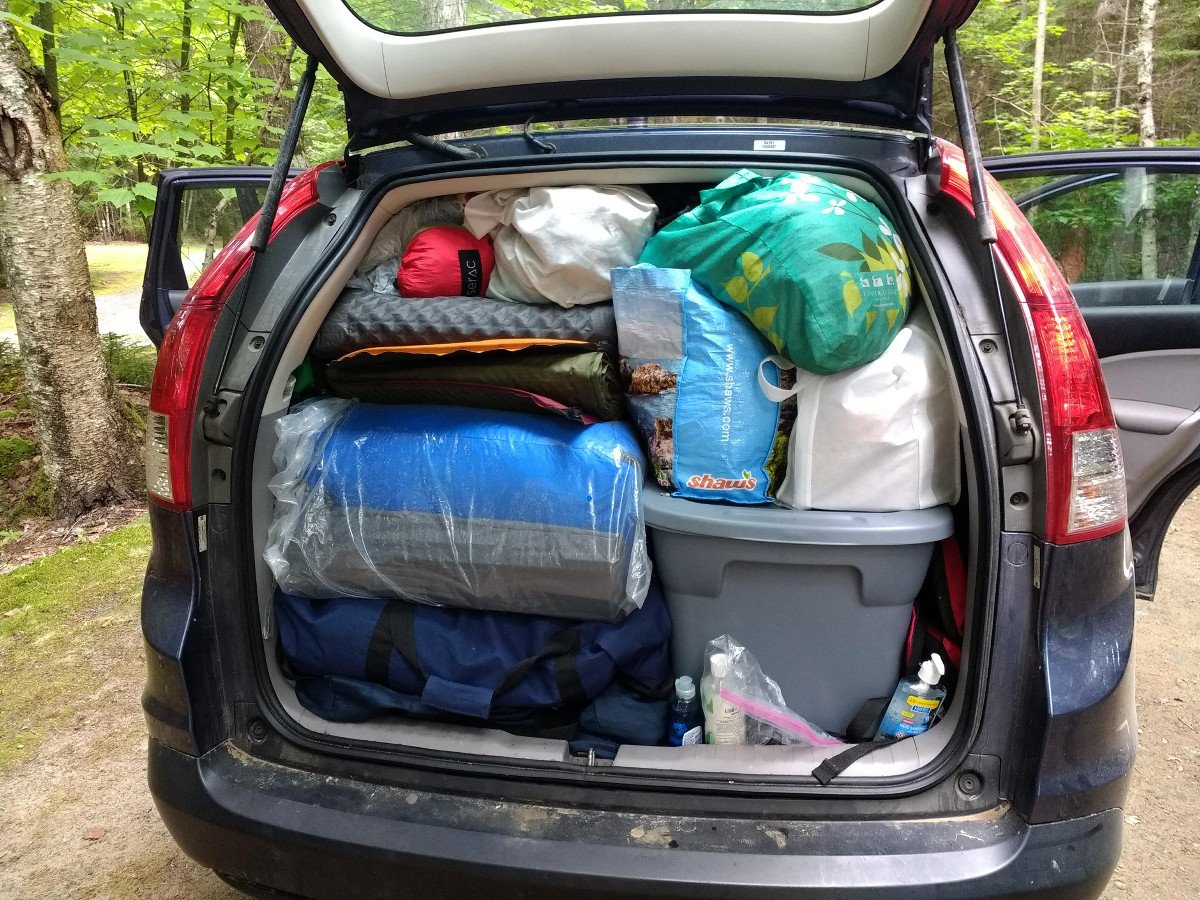 Van packed full of camping gear