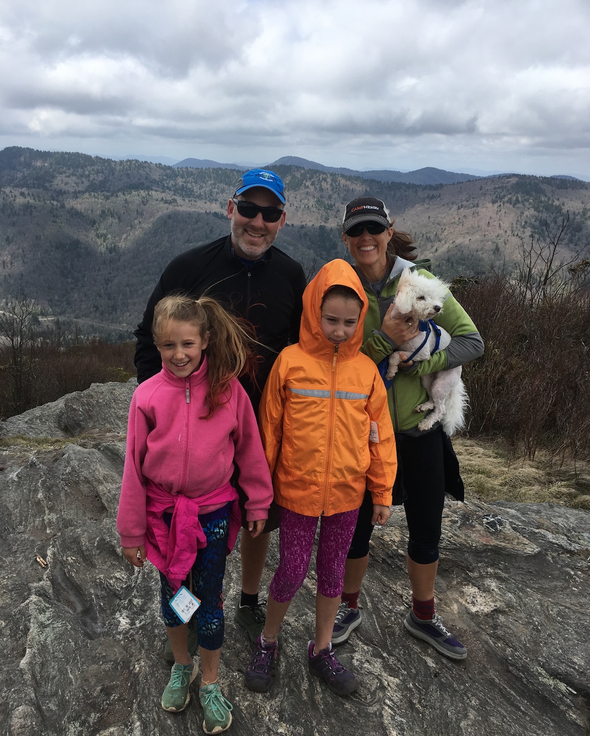 Andrew Bobilya and his family smile while hiking in North Carolina