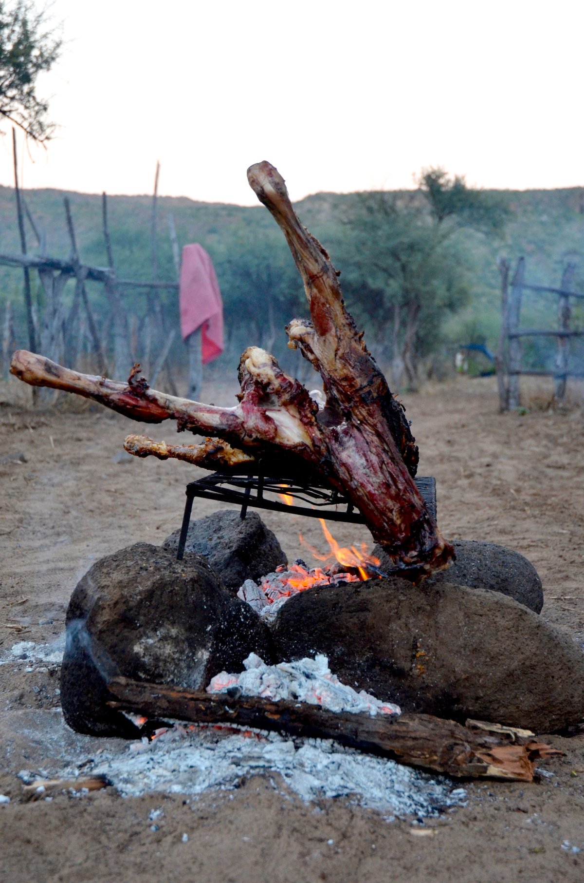 Roasting a goat on fire