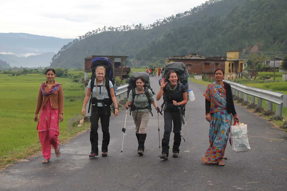 NOLS students hike with local women in the Indian Himalaya