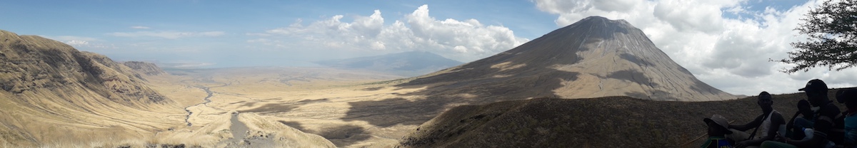 Panoramic scene with OldoinyoLengai mountain ion the horizon
