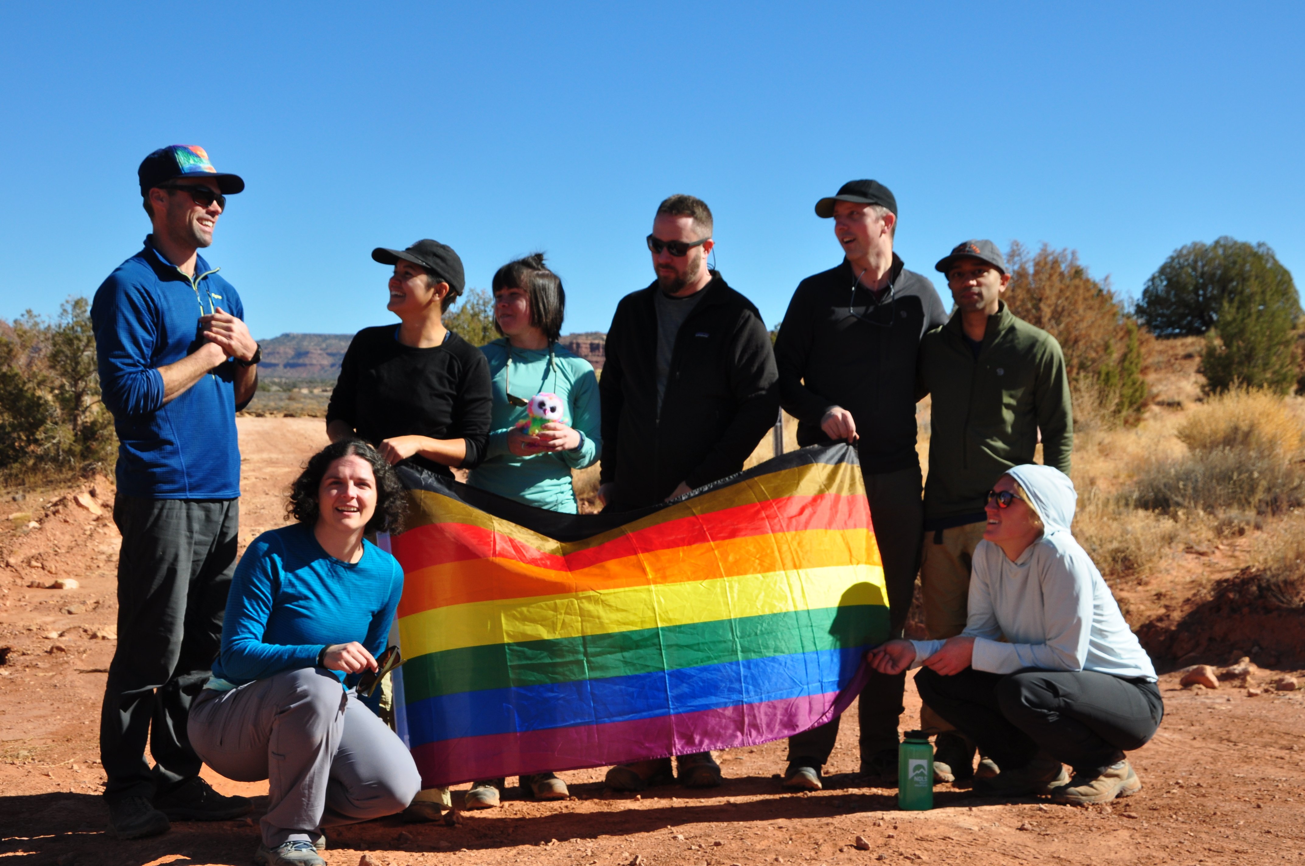 NOLS LGBTQ+ Canyonlands grads celebrate before the start of their course.
