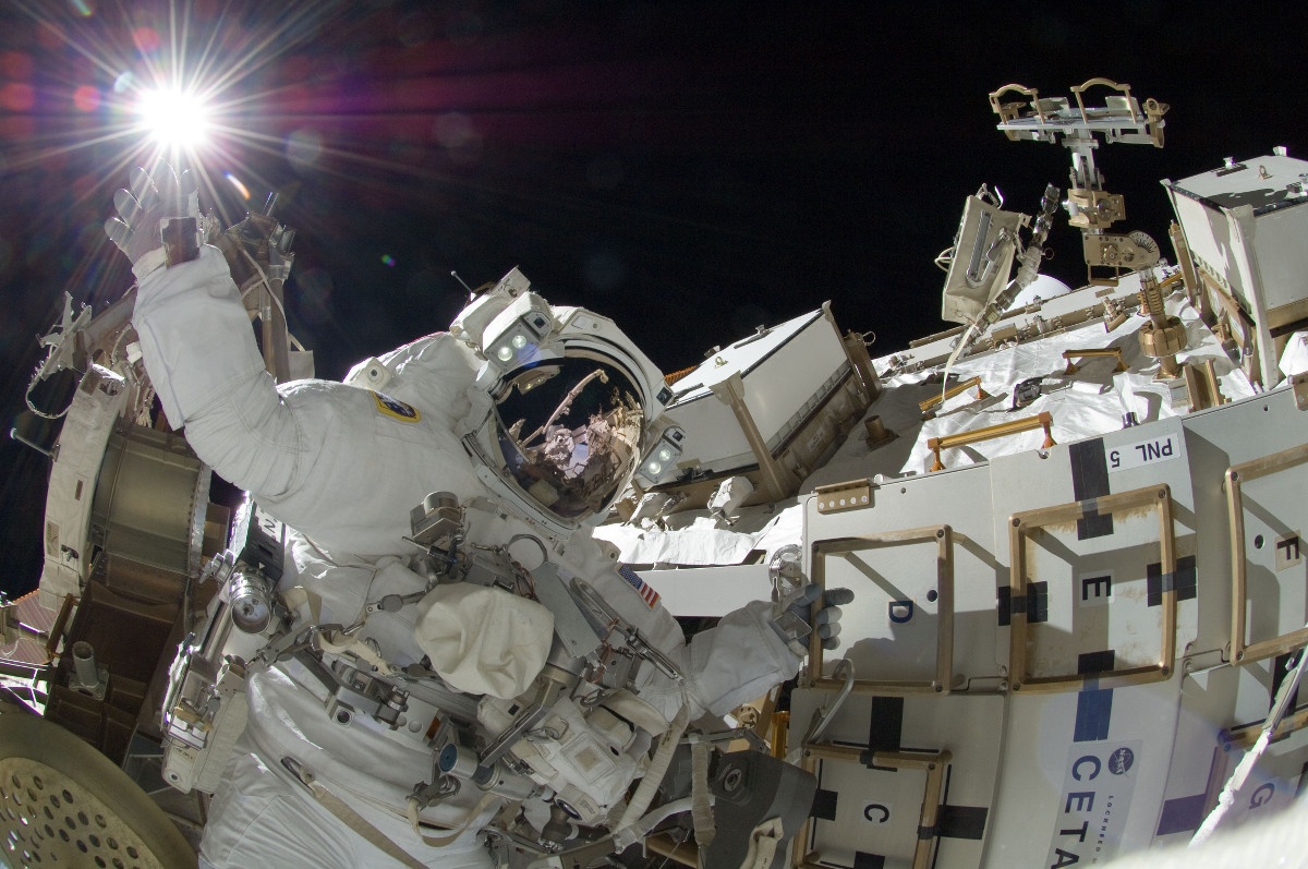 NASA astronaut Sunita Williams performs repairs on the International Space Station during a six-hour spacewalk.
