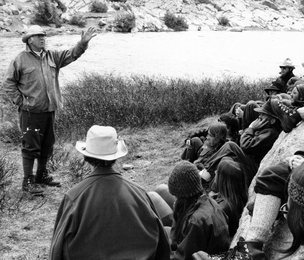 Paul Petzoldt leads a group of students in the early years of NOLS.